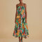 model wearing green abstract print midi sundress with kerchief hem and tie shoulder straps