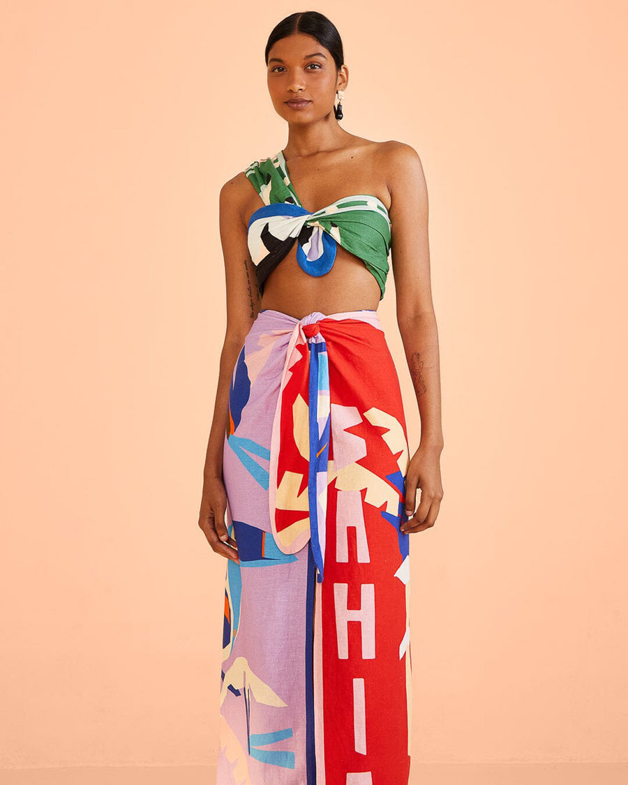 model wearing colorful abstract print tie waist skirt