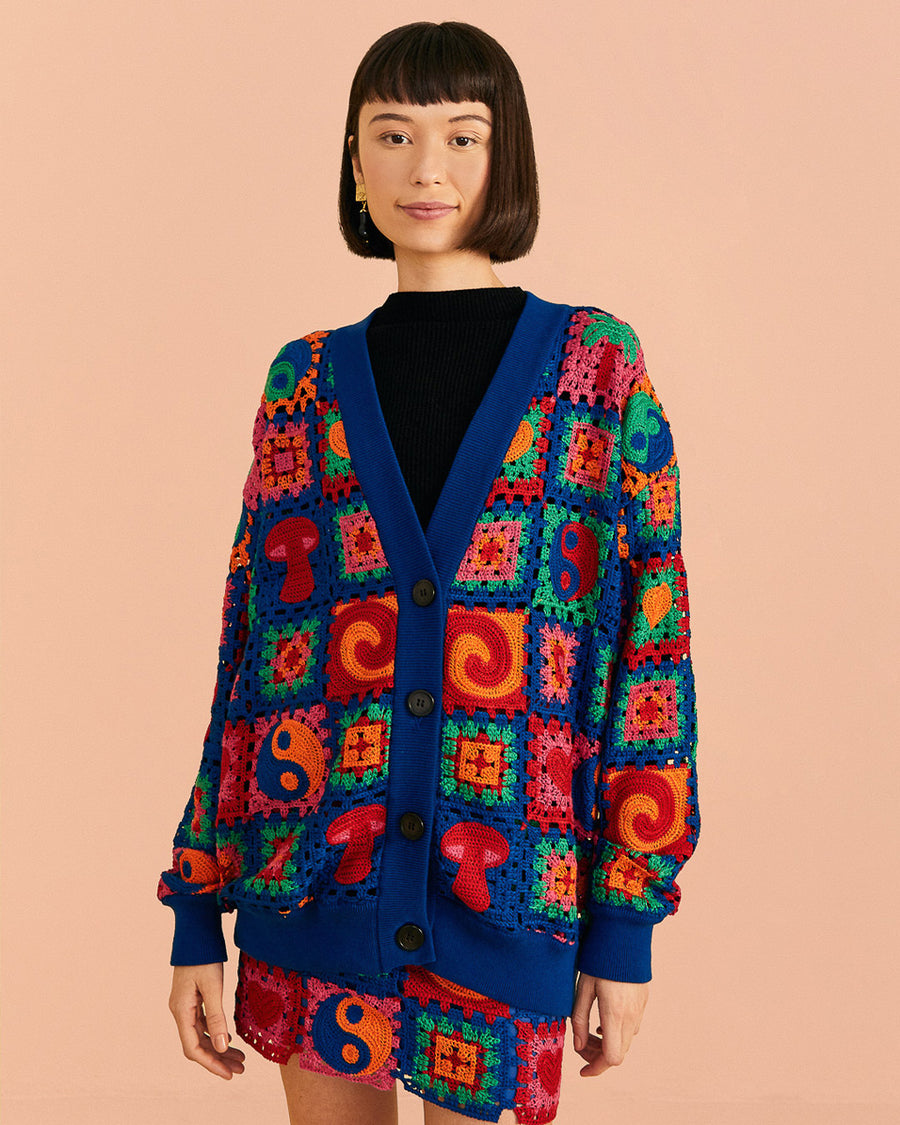 navy blue patchwork cardi with mushroom, yin yang, swirls and patchwork designs