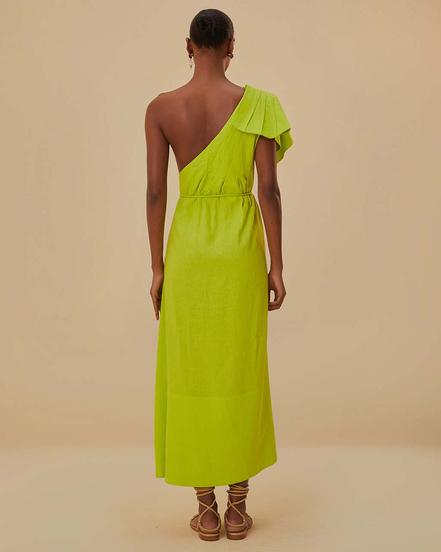 back view of model wearing lime green maxi dress with tie waist and one shoulder 'leaf' detail with pleats