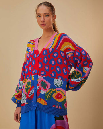 model wearing relaxed fit cardigan with colorful waves, colorful leopard print and colorful abstract fruit print