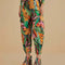 model wearing colorful abstract print pants with elastic and tie waist