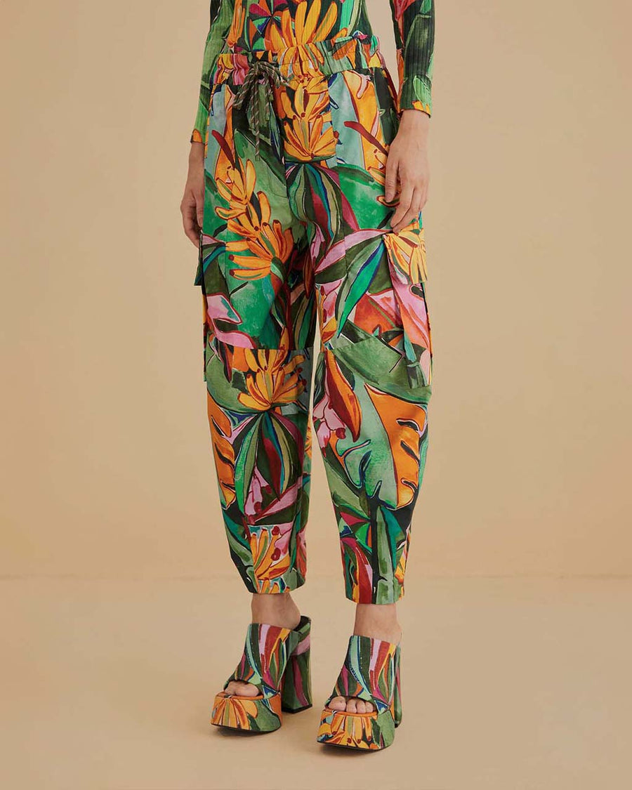 model wearing colorful abstract print pants with elastic and tie waist