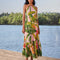 model wearing pink banana leaves maxi dress with ric rac tiers, cut-out top and open back