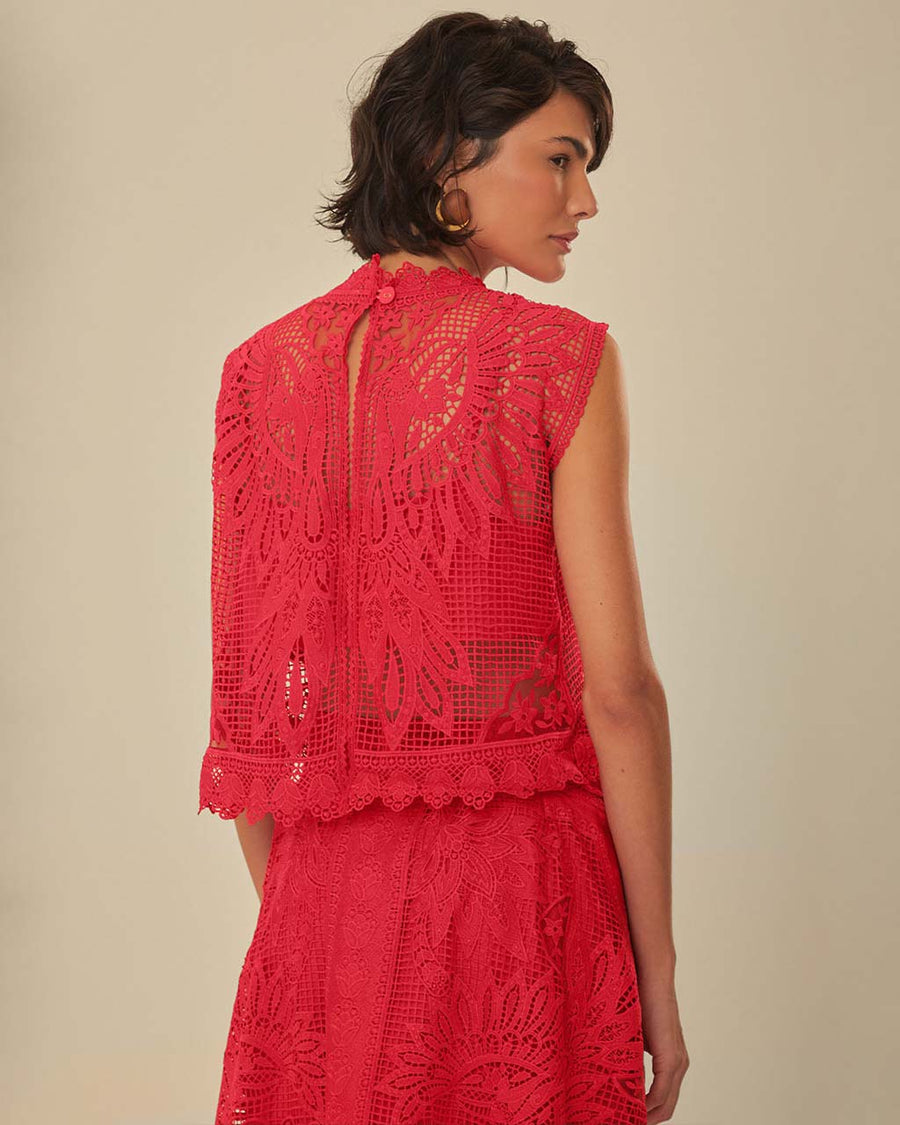 back view of model wearing lace cutout cropped tank