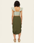 back view of olive green midi skirt with adjustable bungee sides and cargo pockets