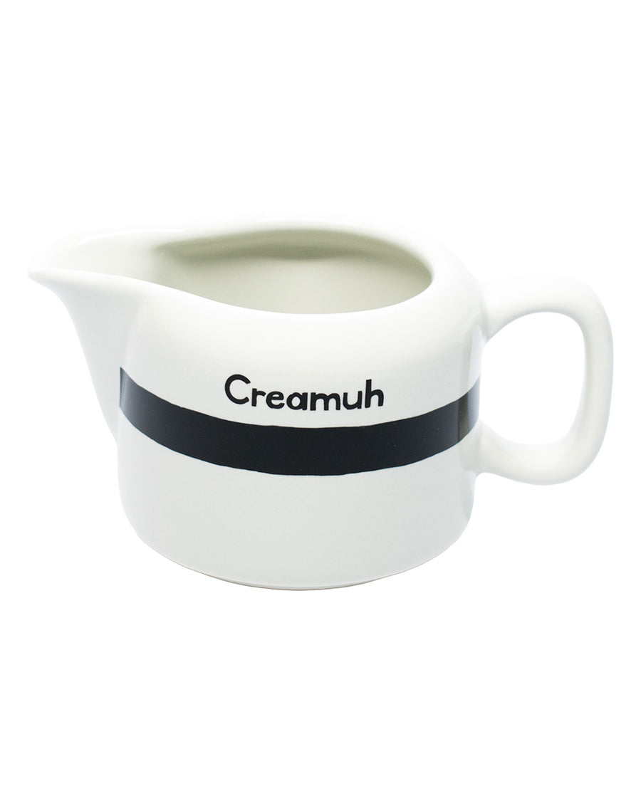 top view of white and black 'Creamuh' dish