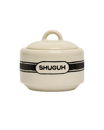 cream sugar bowl with 'SHUGUH' across the front