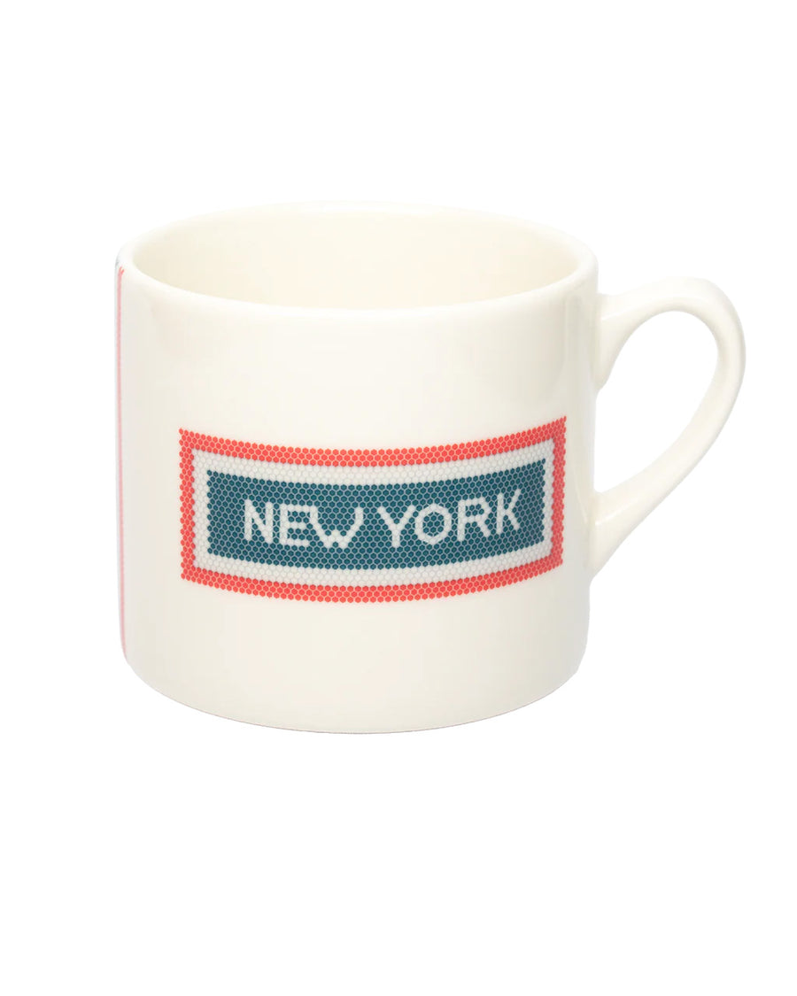 cream coffee mug with red and blue subway tile 'NEW YORK' across the front