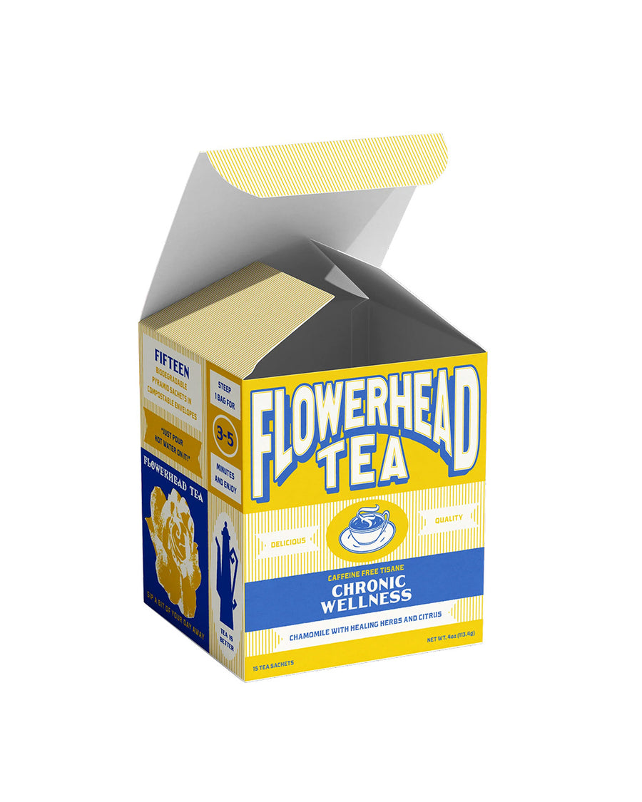 lid opened on box of chronic wellness flowerhead tea with 15 count tea sachets(chamomile with healing herbs and citrus)