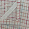hanger of set of two woven dishcloths: white with cranberry and white with plaid in red, pink and blue