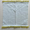 plaid dishcloth with mint with yellow fringe