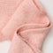 up close of pink knit extra large balabonnet