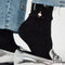 model wearing black speckled socks with ornament detail