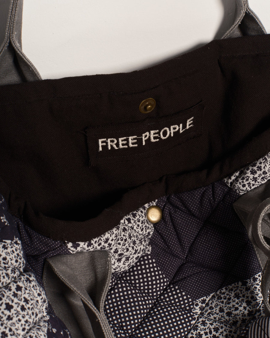 up close of interior of blue, black and grey quilted patchwork bag