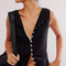 model wearing black ribbed  button front tank