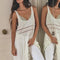 model wearing white sheer maxi slip dress with lace and ruffle details