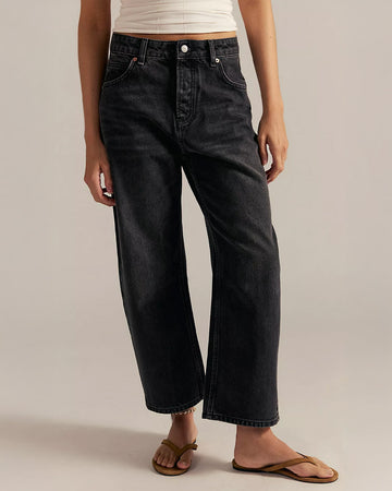 model wearing washed black relaxed fit low rise denim