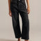 model wearing washed black relaxed fit low rise denim