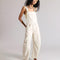 model wearing off-white barrel leg overalls