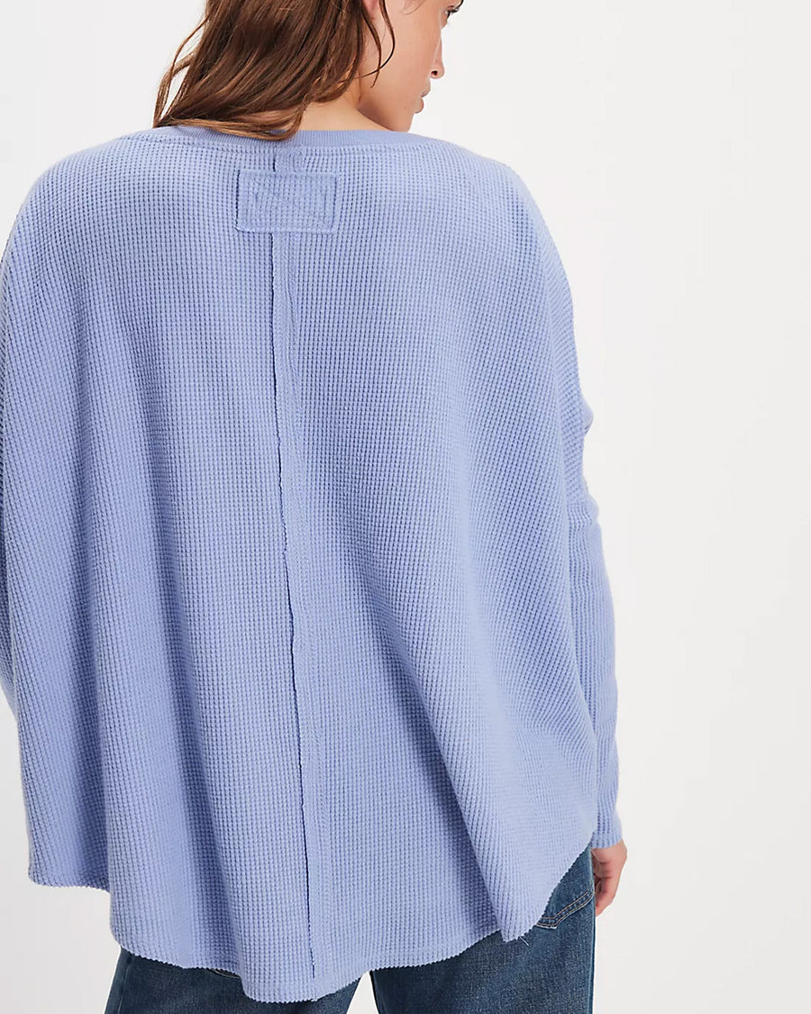 back view of model wearing periwinkle oversized thermal top