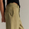 side view of model wearing aloe wide leg high rise barrel leg chino pants