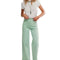 model wearing mint wide leg jeans