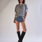 model wearing heather grey oversized tee
