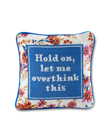 square throw pillow with blue and floral print and 'hold on, let me overthink this' typography across the front