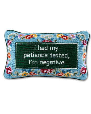 blue floral rectangular throw pillow with 'i had my patience tested, i'm negative' across the front