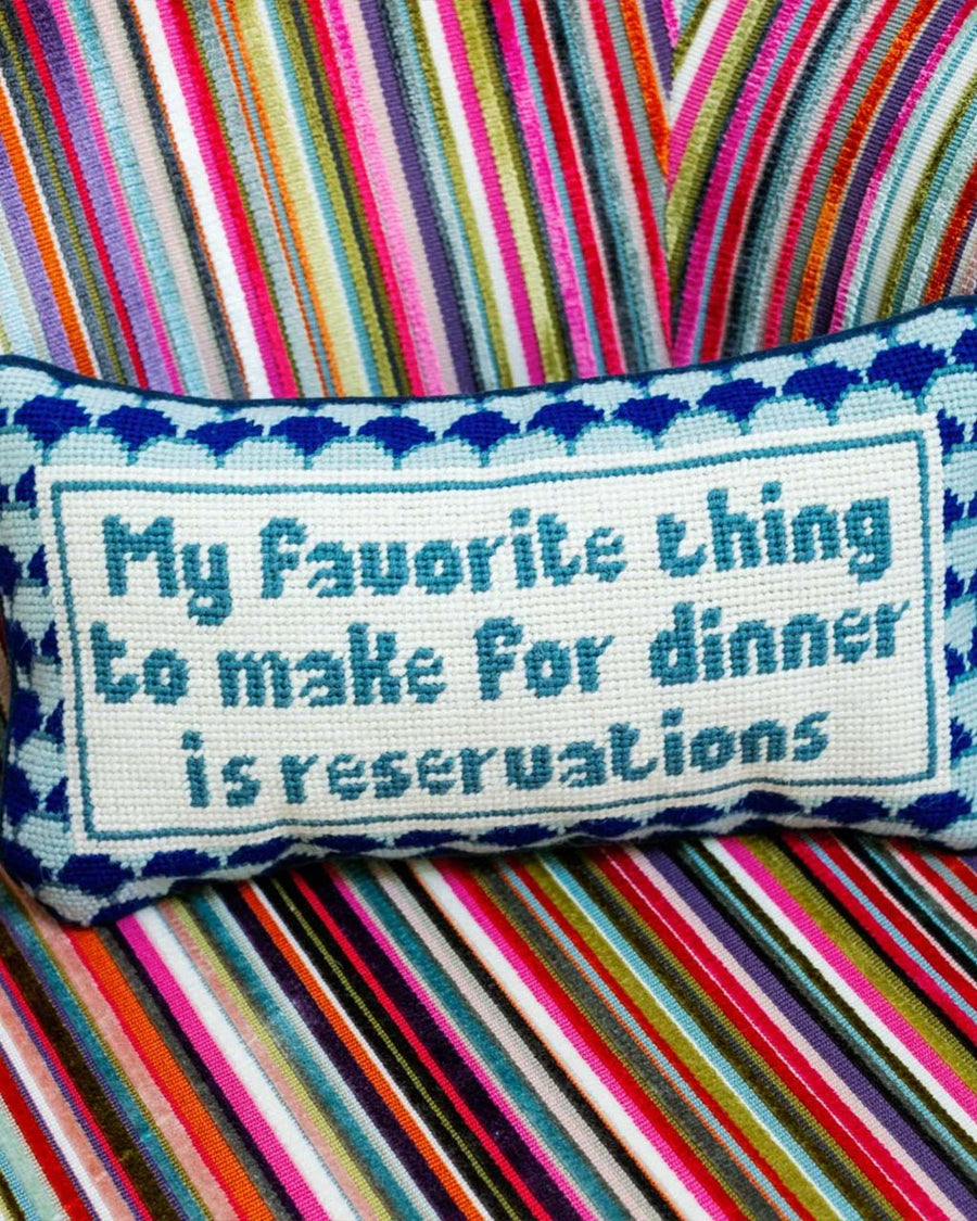 'my favorite thing to make for dinner is reservations' pillow on chair