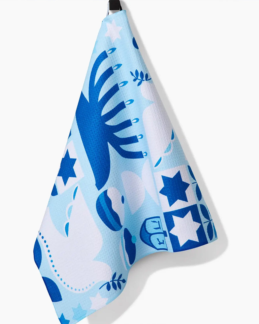 hanging blue and white Hanukkah tea towel