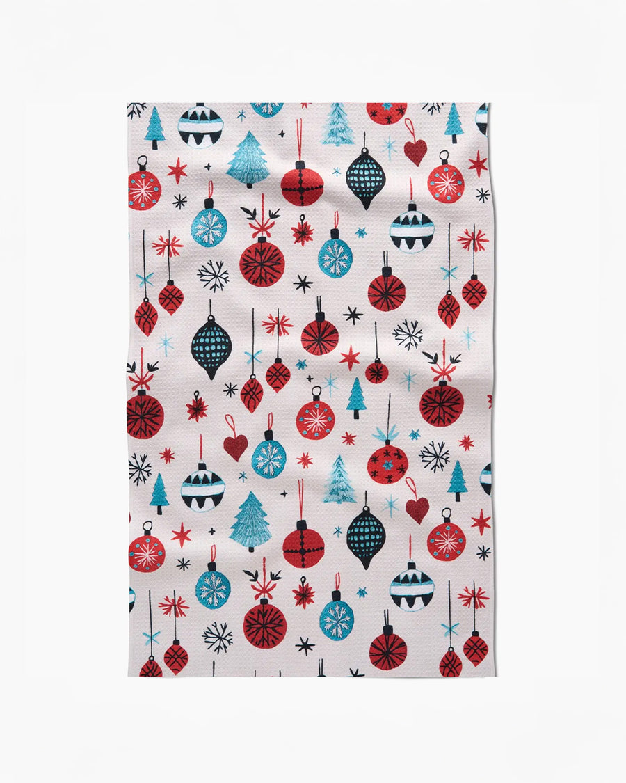cream tea towel with colorful ornament and tree print