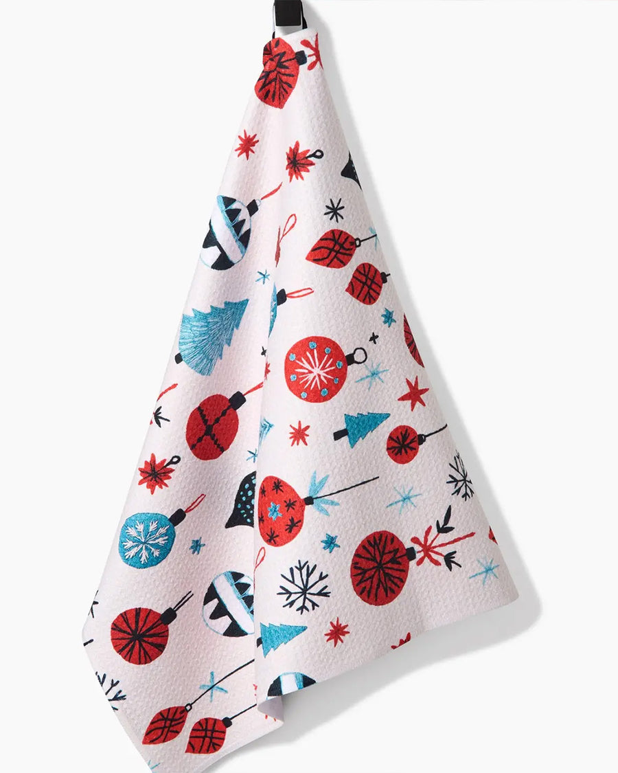 hanging cream tea towel with colorful ornament and tree print