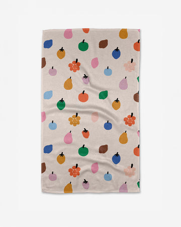 tan teal towel with colorful fruit print