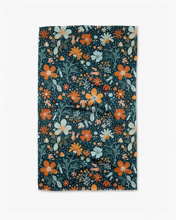 dark teal tea towel with colorful floral print
