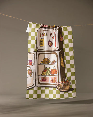 green and white plaid tea towel with a fridge full of fall foods