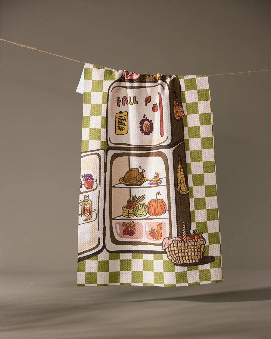 green and white plaid tea towel with a fridge full of fall foods