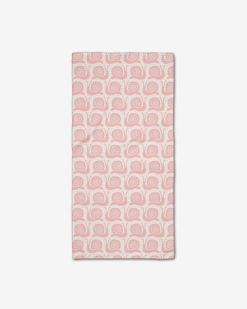 cream bar towel with pink snail print