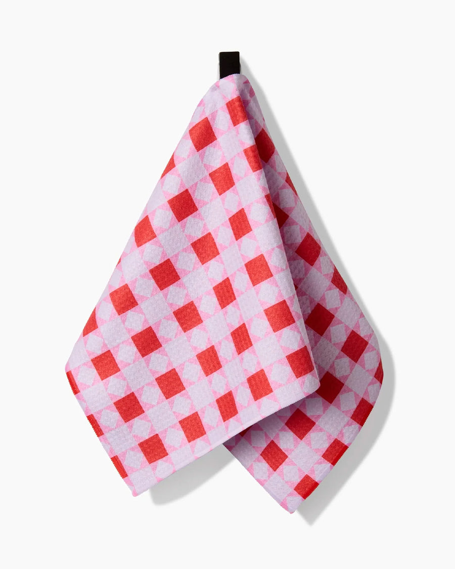 hanging pink and red quilt bar towel 