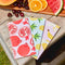 fruit print not paper towels on table with a tray of fruit