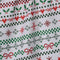 up close of white tea towel with green and red holiday sweater print