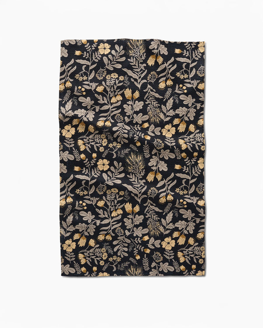black tea towel with golden floral print