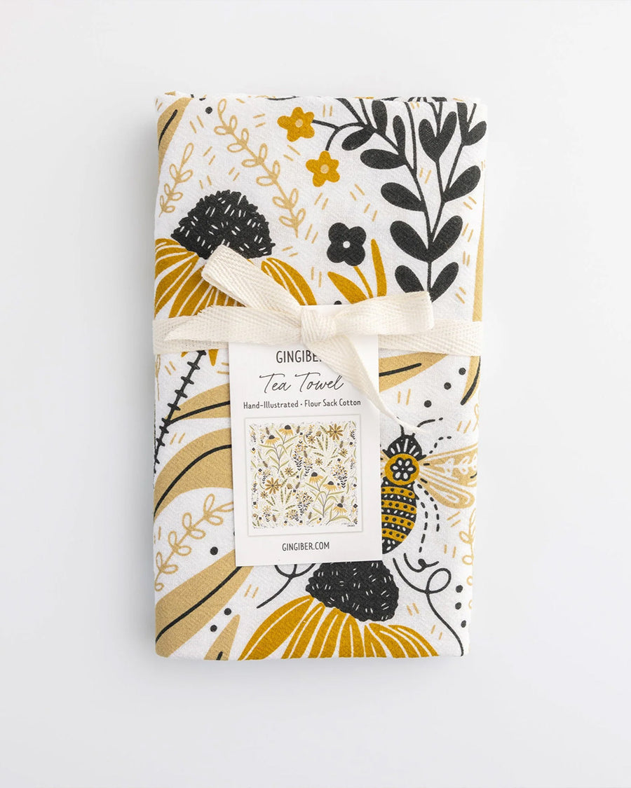 packaged white tea towel with goldenrod floral and bee print