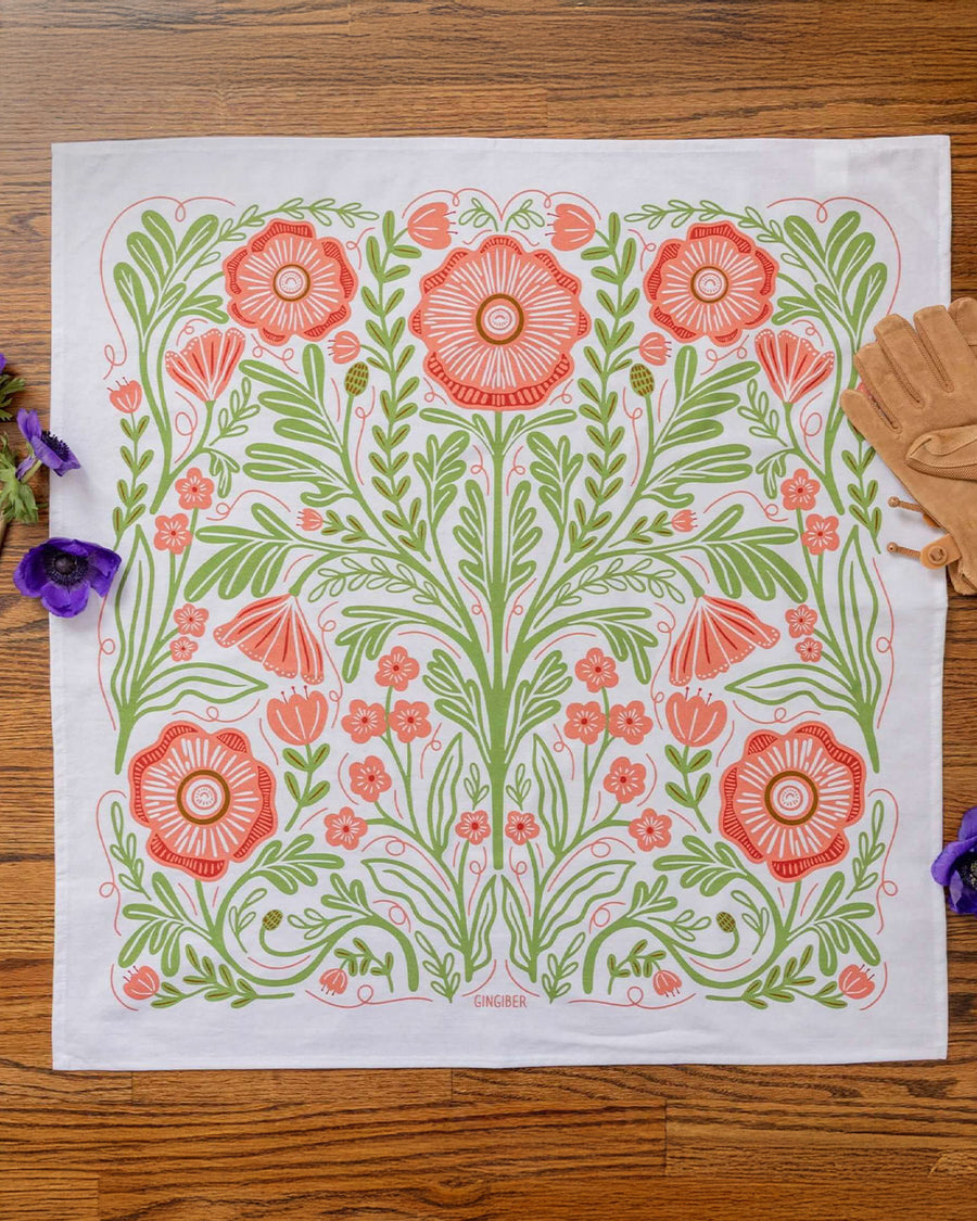 white tea towel with abstract pink poppy print and greenery