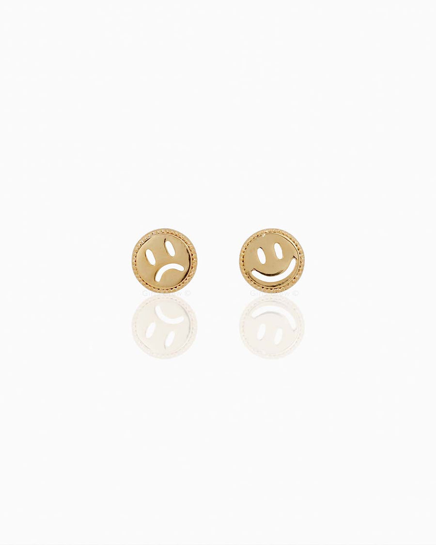 gold smiley and frown-y face stud earrings