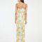 back view of model wearing white and colorful blurred floral tank maxi dress