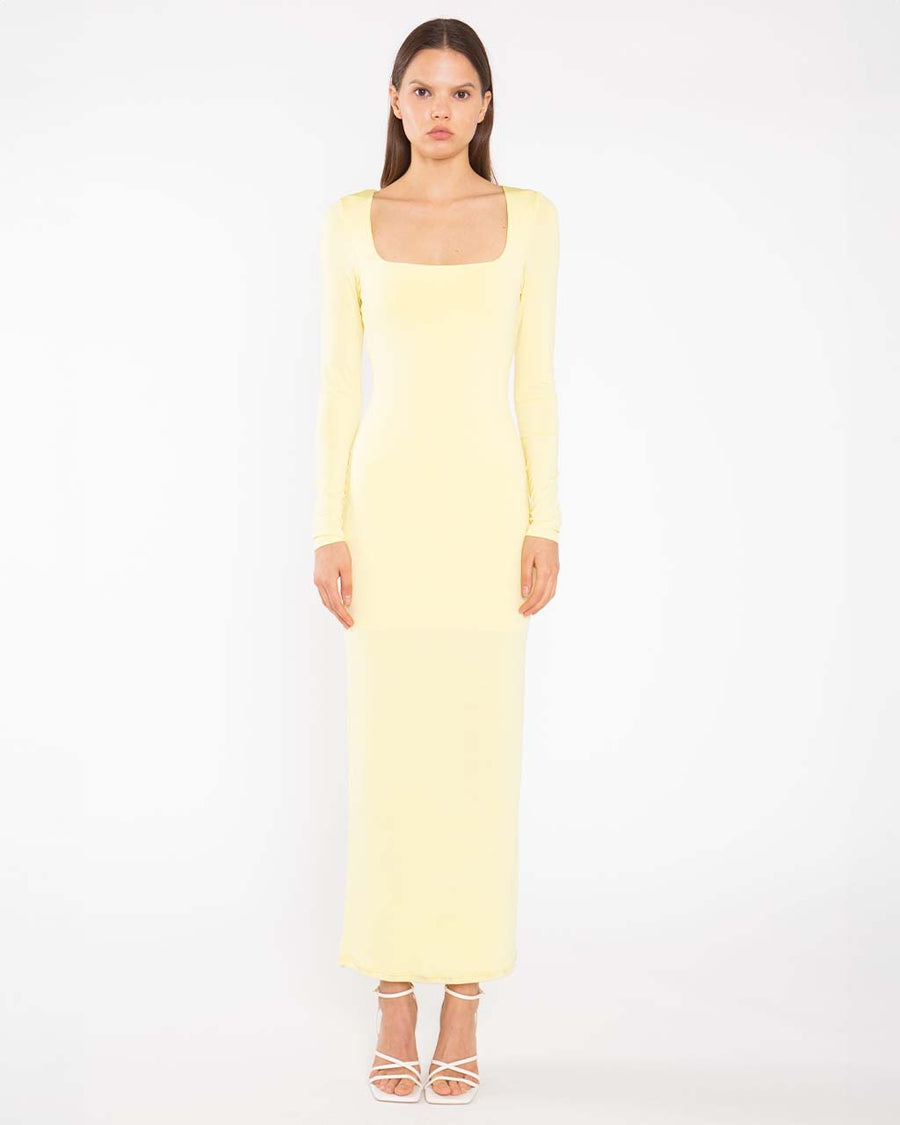 model wearing yellow square neck long sleeve knit maxi dress