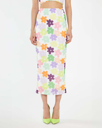 model wearing white mesh midi skirt with colorful abstract flowers
