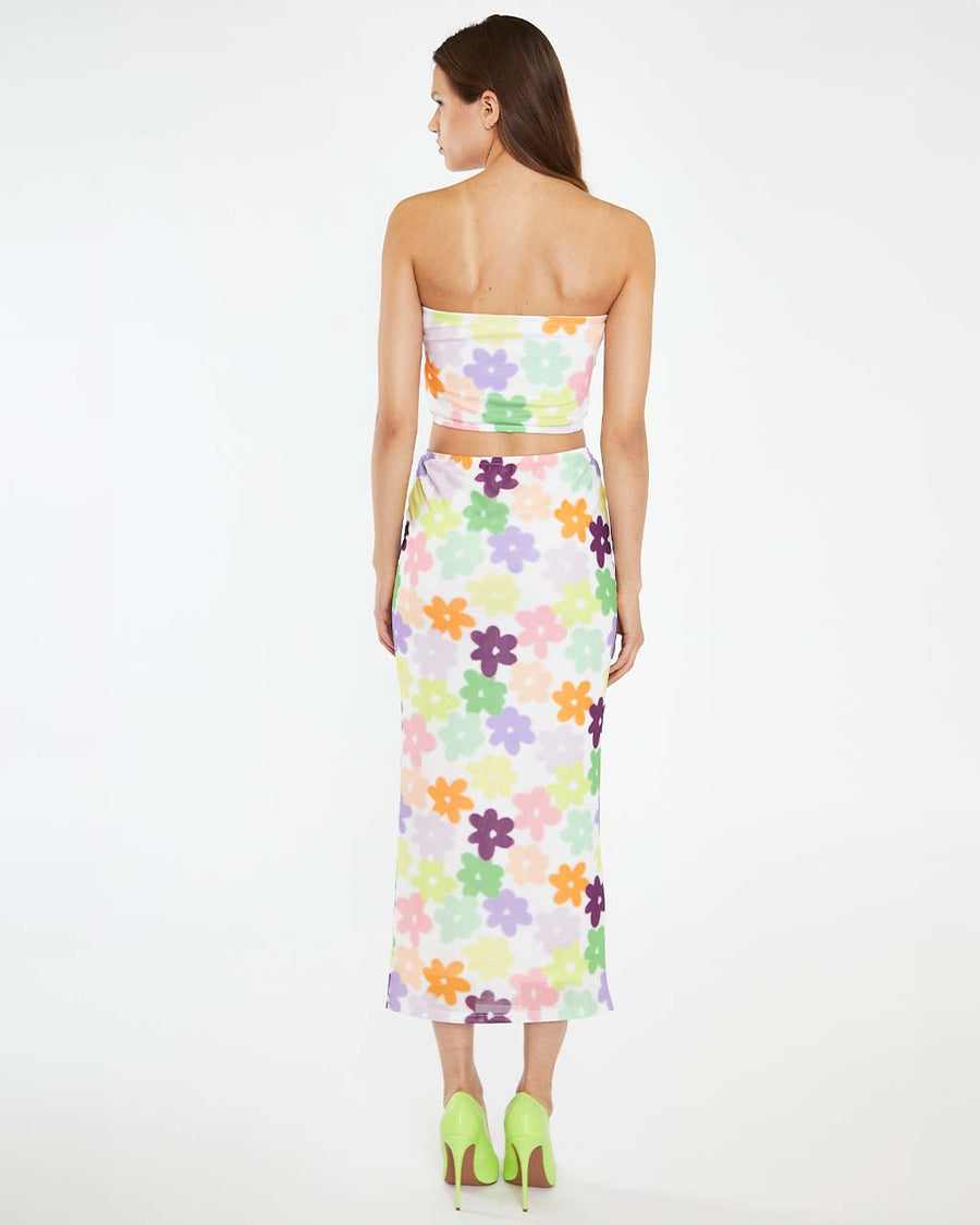 back view of model wearing white mesh midi skirt with colorful abstract flowers